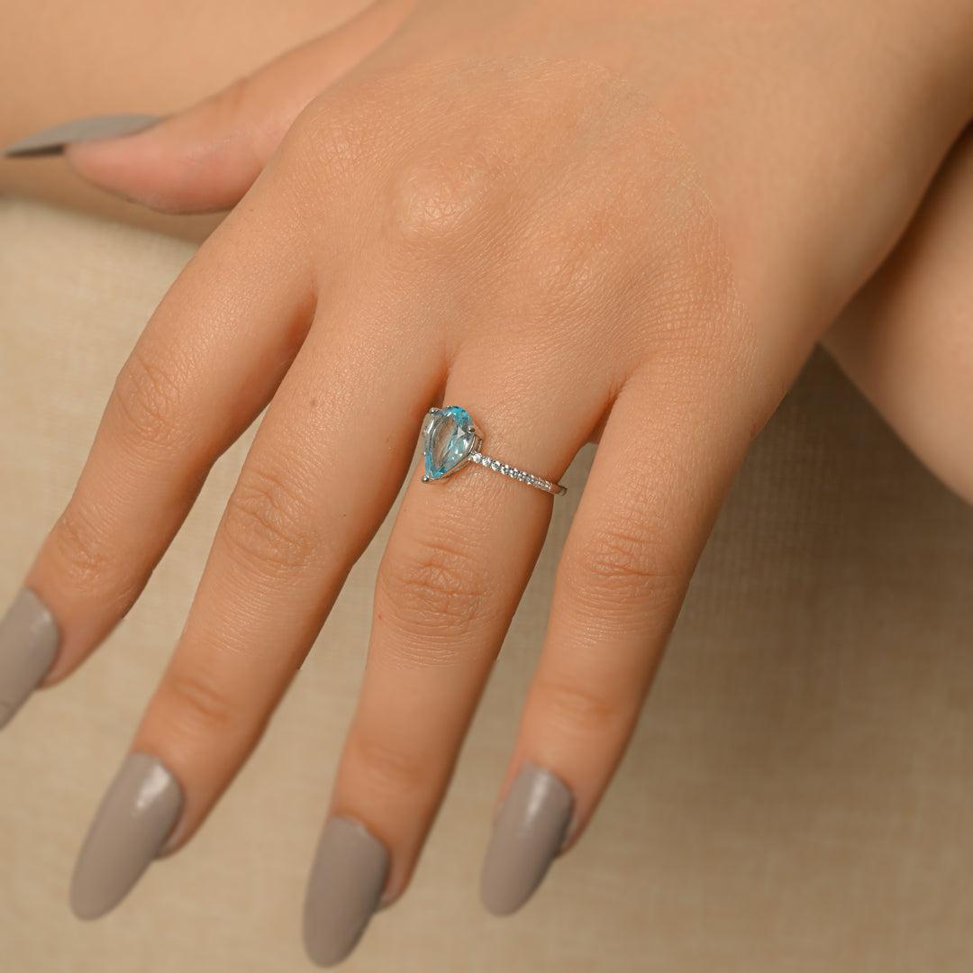 Exquisite Blue Topaz Teardrop Ring