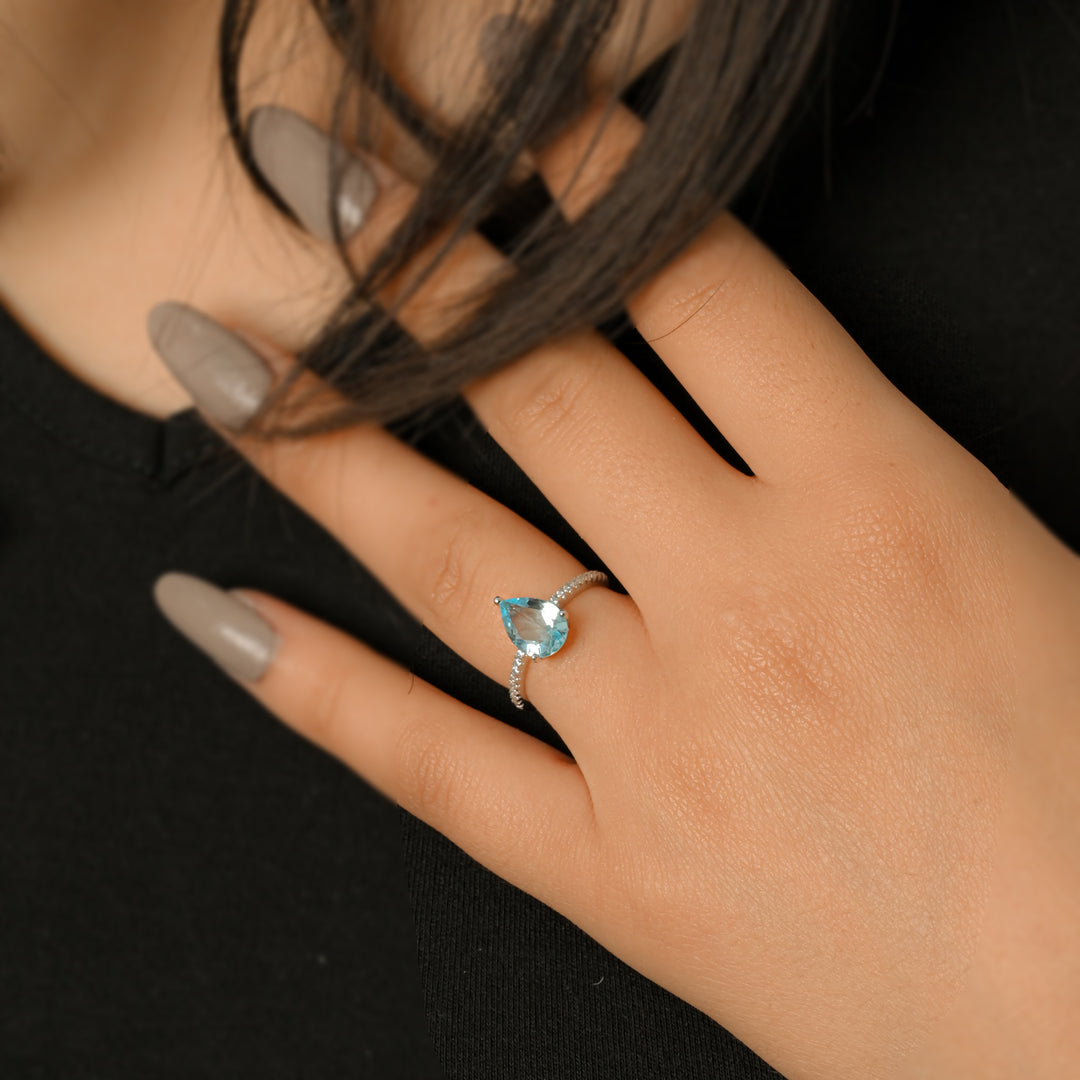 Exquisite Blue Topaz Teardrop Ring