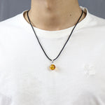 Load image into Gallery viewer, Translucent Baltic Amber Ball pendant 
